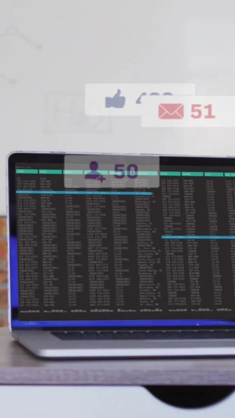 Vertical video: System pinging badges floating over laptop screen showing counts Stock Footage 330655977