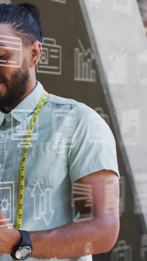 Vertical video: Tailor glancing and adjusting tape, preparing fit while tech Stock Footage 330305942