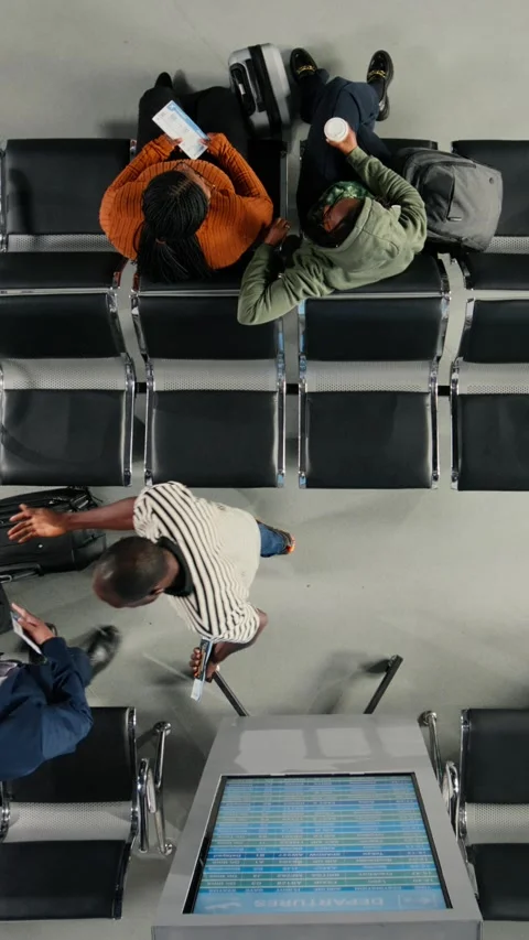 Vertical video Talking, hectic passenger movement concept and people on airport Stock Footage 334850547