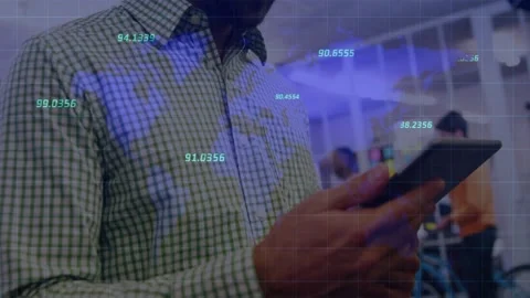 Vertical video: Tapping man in green checking data on tablet at work, with blue Stock Footage 331165407