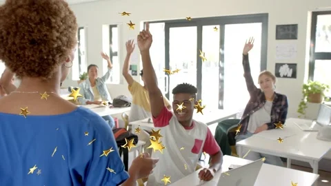 Vertical video: Teacher asking in class, gold stars across frames, front teen Stock Footage 333413776