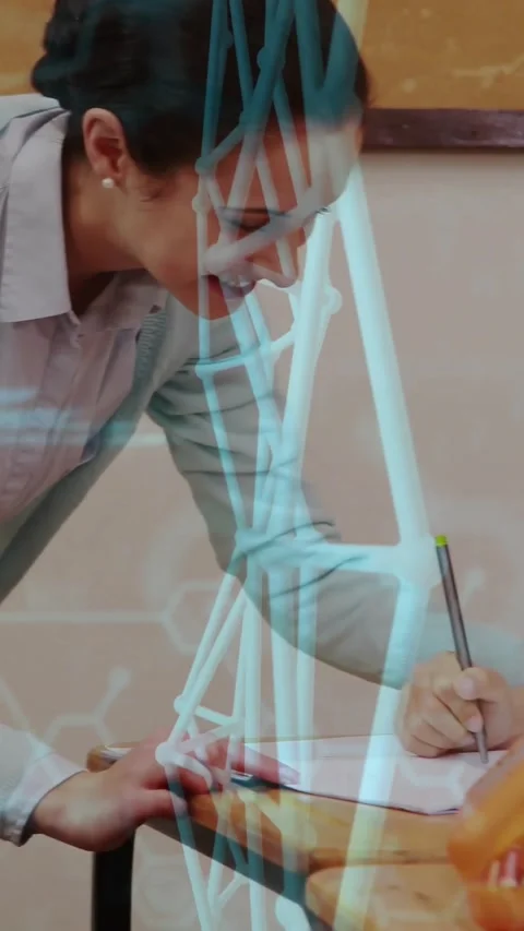 Vertical video: Teacher reaching page, helping students writing while 3D hex Stock Footage 330509702
