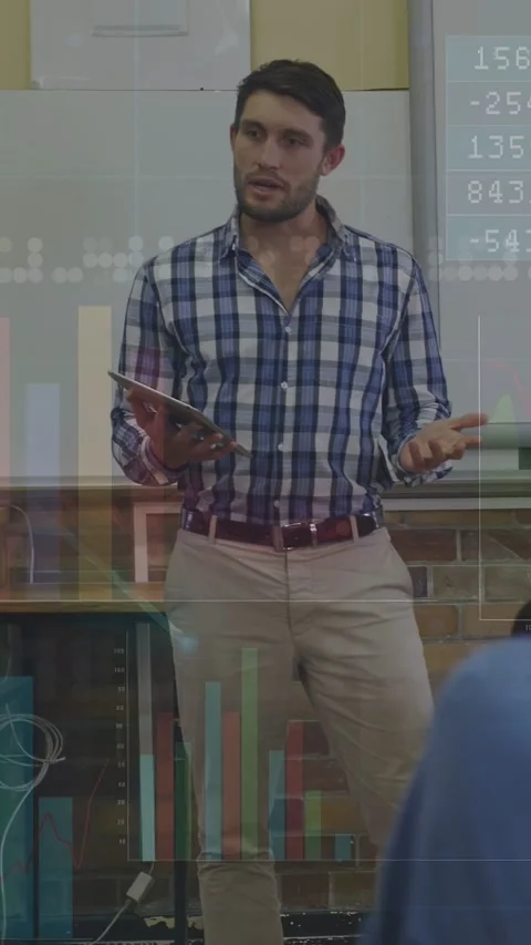 Vertical video: Teacher referencing tablet and teaching data, animated charts Stock Footage 333542426