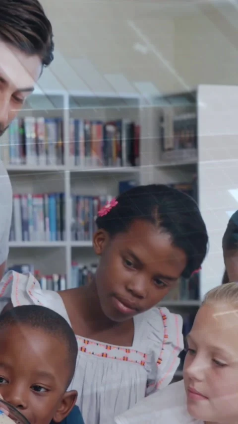 Vertical video: Teacher showing globe, urging kids to spin globe as map labels Stock Footage 332317689