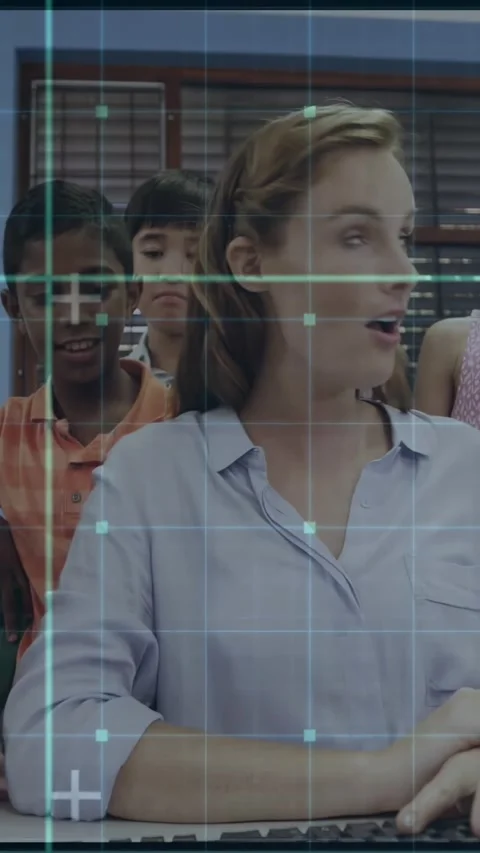 Vertical video: Teacher typing at keyboard, activating HUD overlay, teaching Stock Footage 331270926