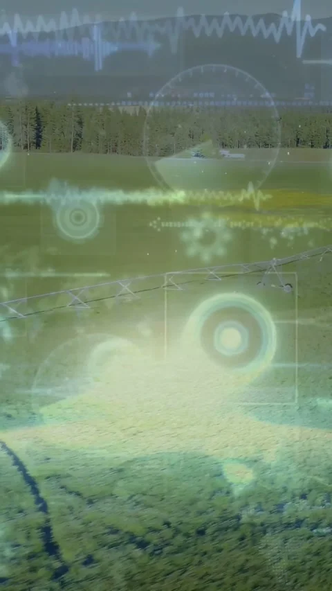 Vertical video: Teal overlay activating, HUD rings pulsing over pivot and field, Stock Footage 334540541