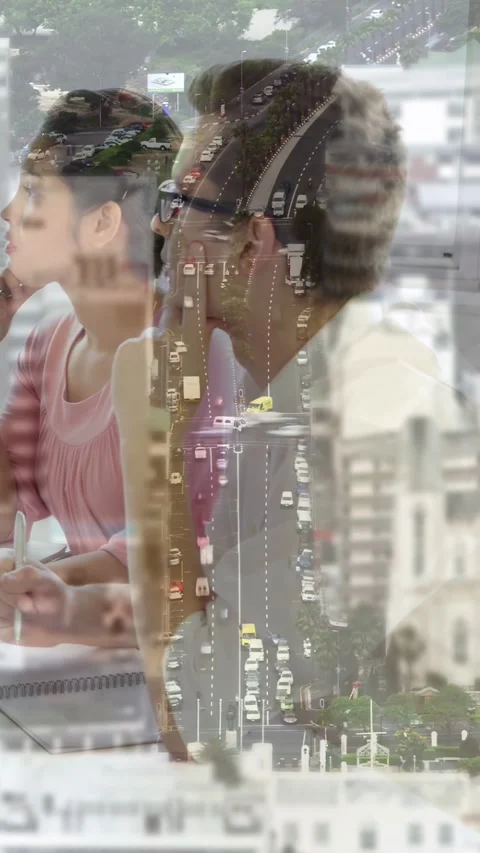 Vertical video: Team on data showing traffic overlay moving over group taking Stock Footage 335513178