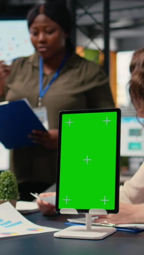 Vertical Video Team of goals oriented women work with a copy space display on Stock Footage 314623431