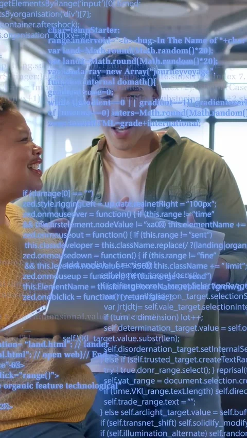 Vertical video: Team holding laptop up, pointing and checking tech while blue Stock Footage 334694913