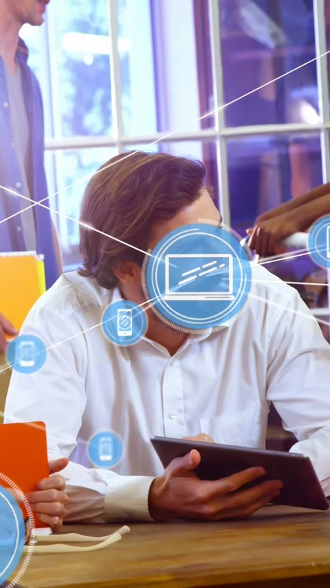 Vertical video: Team lead interacting with tablet, generating blue device 스톡 동영상 333157473
