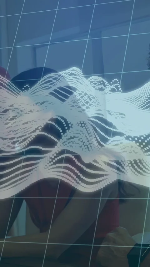 Vertical video: Team leaning over table in tech demo, animated grid wave moving, Stock Footage 333720999