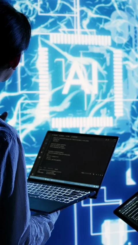 Vertical video Team members run AI code in data center Stock Footage 249084434