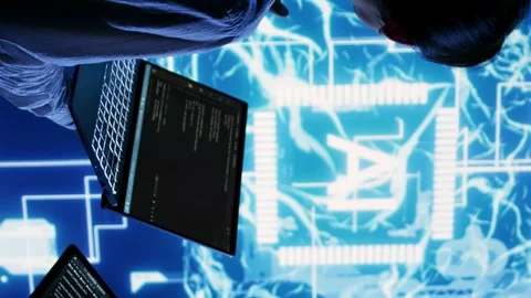 Vertical video Team members run AI code in data center Stock Footage 250361008