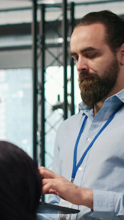 Vertical video Team of programmers in office developing software applications Stock Footage 312709087