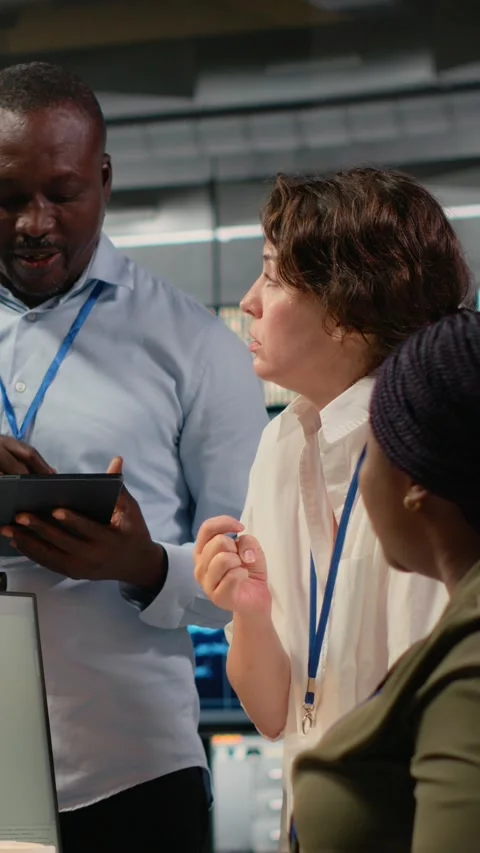 Vertical video Team of software developers in office working together Stock Footage 322696526