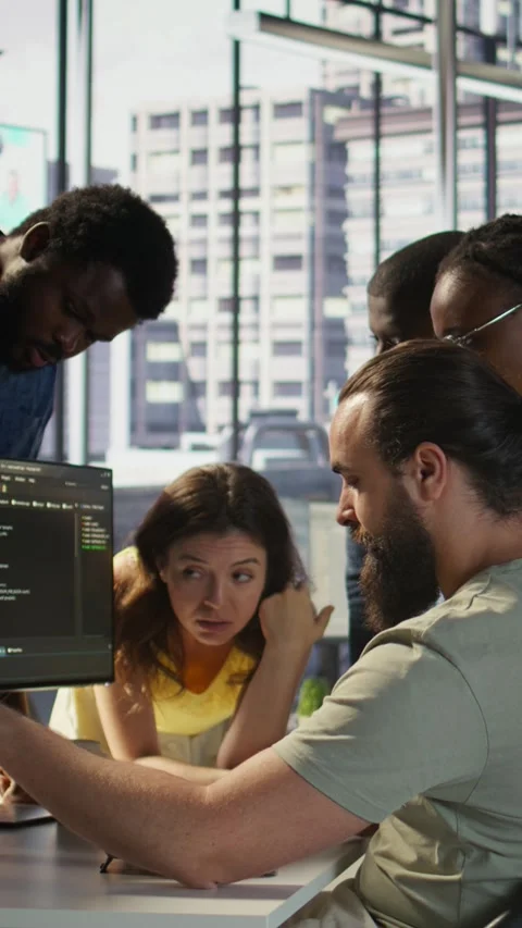 Vertical video Team of software engineers doing brainstorming in office Video stock 319483024