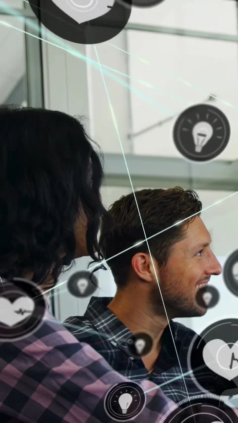 Vertical video: Team tapping phone at glass, watching AR icons linking into tech Stock Footage 334317302