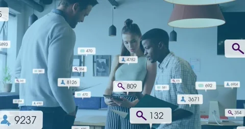Vertical video: Team tapping tablet causing floating data badges while reviewing Stock Footage 331108646