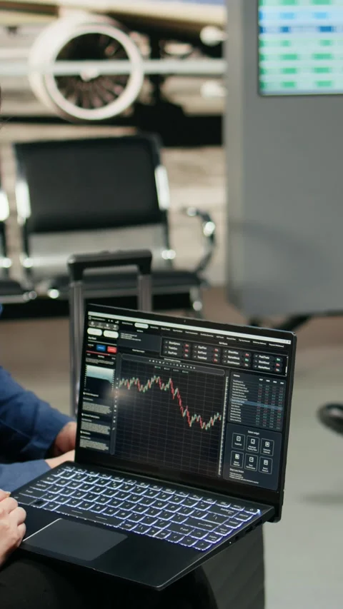 Vertical Video Team of two delegates monitoring trading data and stock exchange Stock Footage 339665893