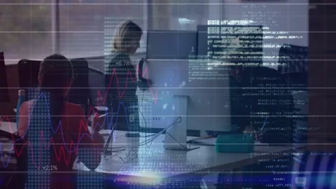 Vertical video: Team typing and writing at desk, typing initiating animated code Stock Footage 333210853