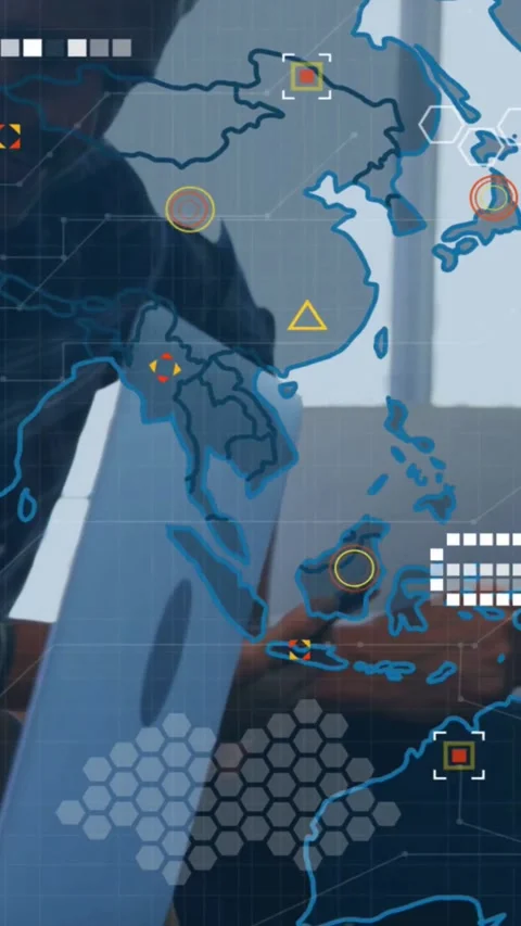 Vertical video: Team using phones while camera pulling showing map HUD covering Stock Footage 331759724