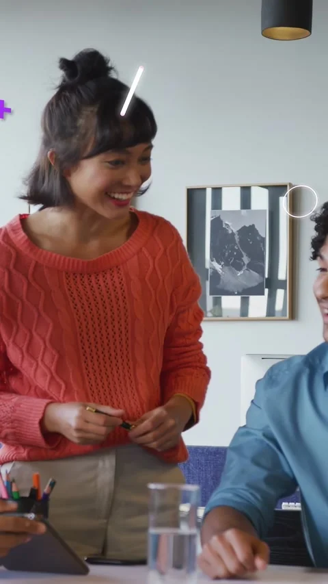 Vertical video: Teammate tapping tablet, woman checking docs with pen for work Stock Footage 334024897