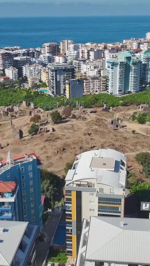 Vertical Video: Teams on a Construction Site Fixing Facades, Assembling Metal Stock Footage 297754507