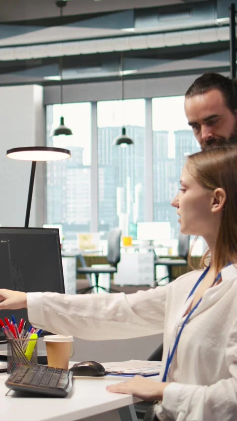 Vertical video Teamworking programmers developing software applications, working Stock Footage 312709517