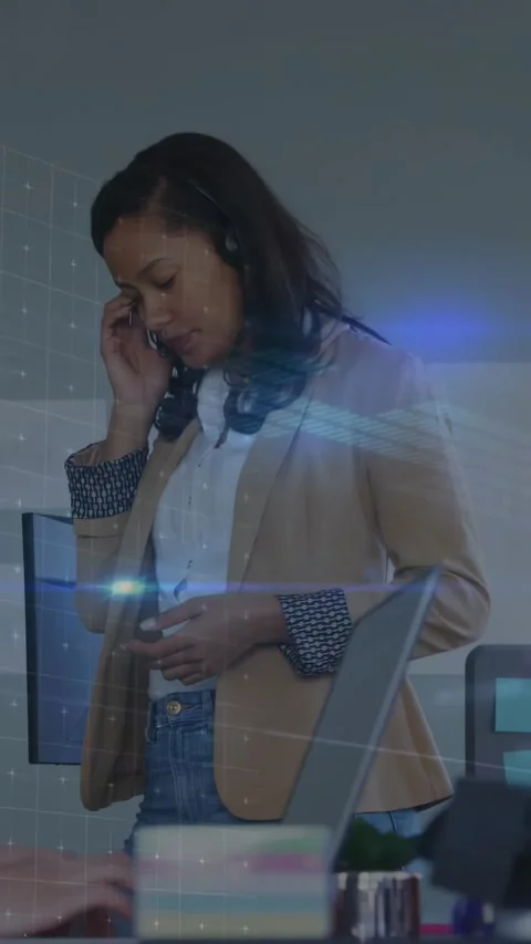 Vertical video: Tech agent tapping headset switching to handset to continue Stock Footage 331168366