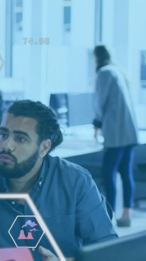 Vertical video: Tech analyst glancing up as AR hex icons appearing on screen, Stock Footage 335513201
