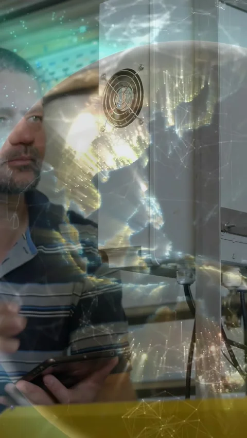 Vertical video: Tech checking phone, tightening vent screws for cable check, Stock Footage 334604874