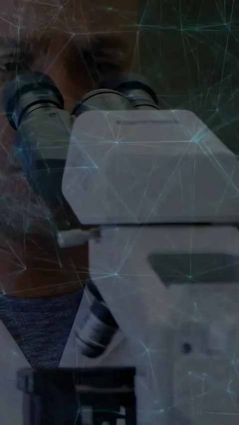 Vertical video: Tech coming to scope, leaning, aligning gaze, scanning slide Stock Footage 331077128