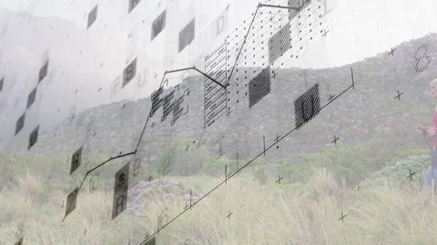 Vertical video: Tech data feed driving line graph and tiles, pair walking uphill Stock Footage 333351246