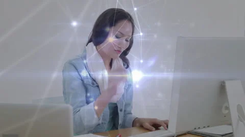Vertical video: Tech dev typing at desk starting net nodes lighting face pausing 動画素材 331006068