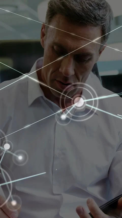 Vertical video: Tech exec using stylus on tablet, HUD starting on chest and Stock Footage 333020889