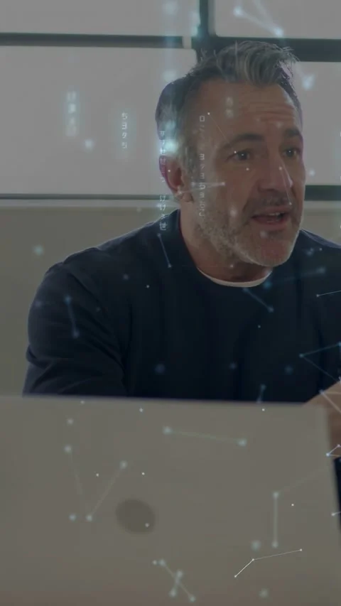 Vertical video: Tech lead starting demo and showing data while nodes growing Stock Footage 334705114