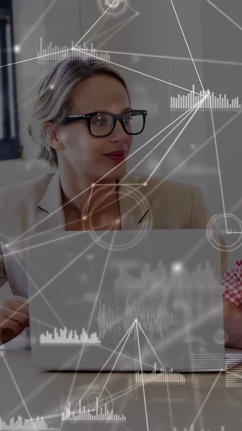 Vertical video: Tech manager hearing cue, watching network graphs drifting over Stock Footage 331338034