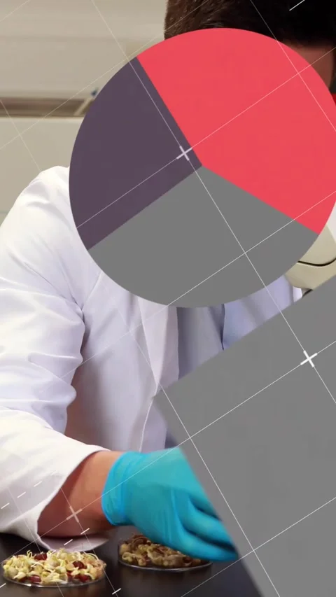 Vertical video: Tech placing sample on scope focusing with pie charts overlaying Stock Footage 330430369