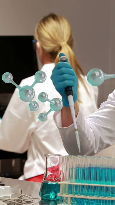 Vertical video: Tech pressing plunger, moving liquid into rack for lab, models Stock Footage 335264205