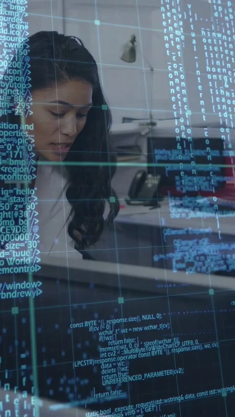 Vertical video: Tech pro receiving update leaning typing checking docs for Stock Footage 332846089