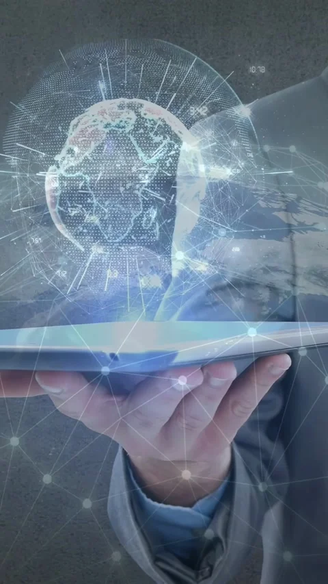 Vertical video: Tech pro tapping tablet, holding while 3D globe rising and Stock Footage 333069544