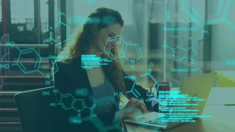 Vertical video: Tech pro typing code on laptop, causing cyan molecule overlay Stock Footage 332686001