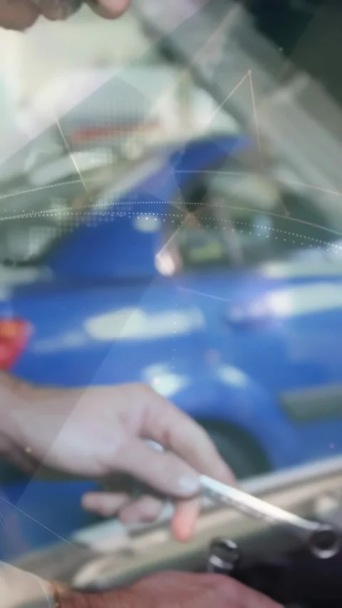 Vertical video: Tech pulling wrench out pocket, changing tools and turning bolts Stock Footage 332598377