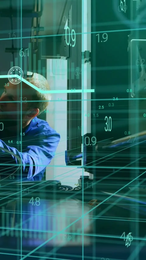 Vertical video: Tech reaching tool adjusting alignment for QC as teal grid Stock Footage 333862476