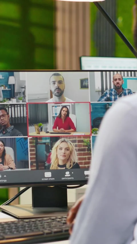 Vertical video Tech startup office team collaborating via videocall, doing Stock Footage 312708125