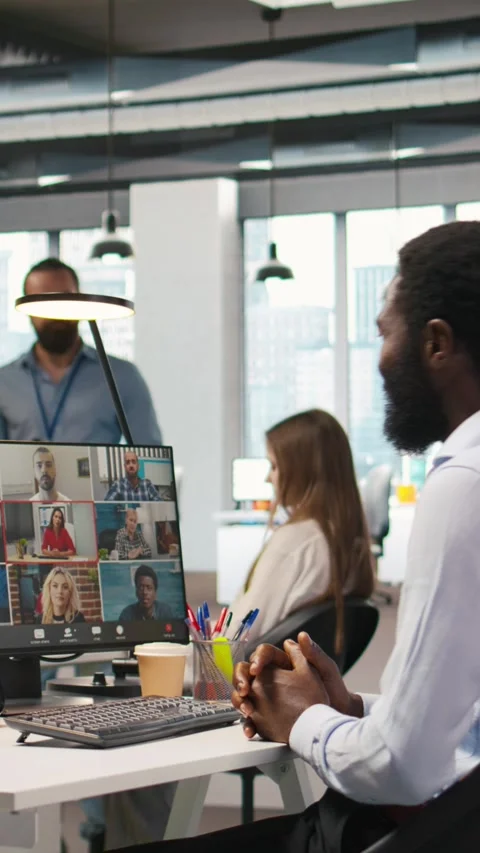 Vertical video Tech startup office team collaborating via videocall, doing Stock Footage 312769316