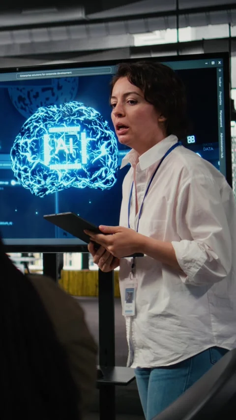 Vertical video Tech startup office CTO doing presentation on machine learning to Stock Footage 323331144