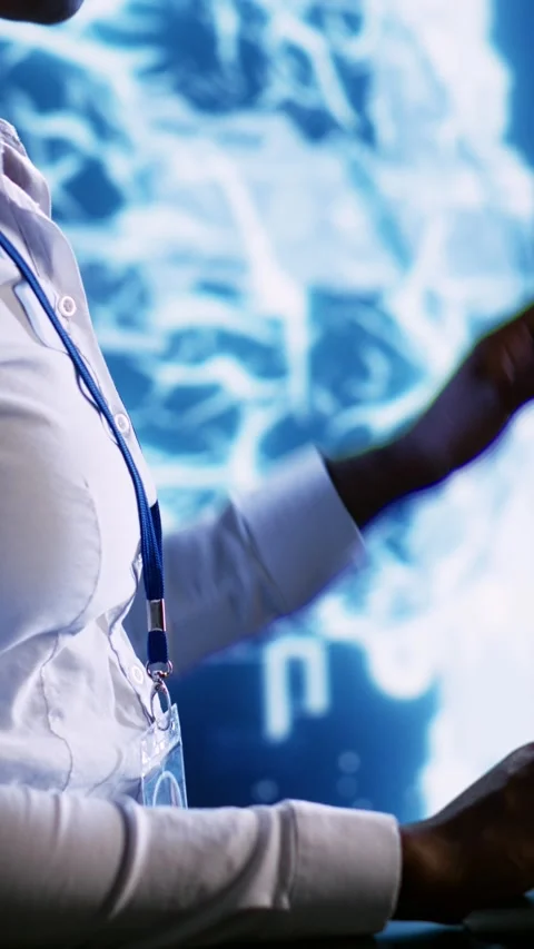 Vertical video Tech support employee writing AI script Stock Footage 249083592