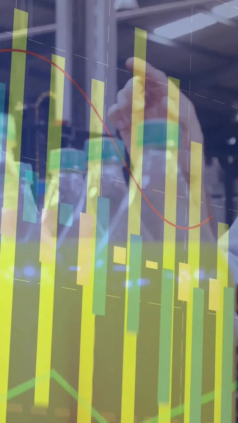 Vertical video: Tech tapping tablet and gesturing as charts updating over Stock Footage 330581170