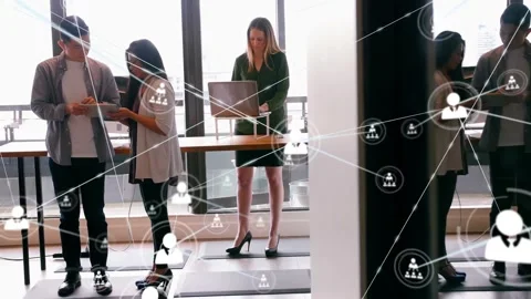 Vertical video: Tech team using tablet and laptop while syncing causing node 스톡 동영상 334039500